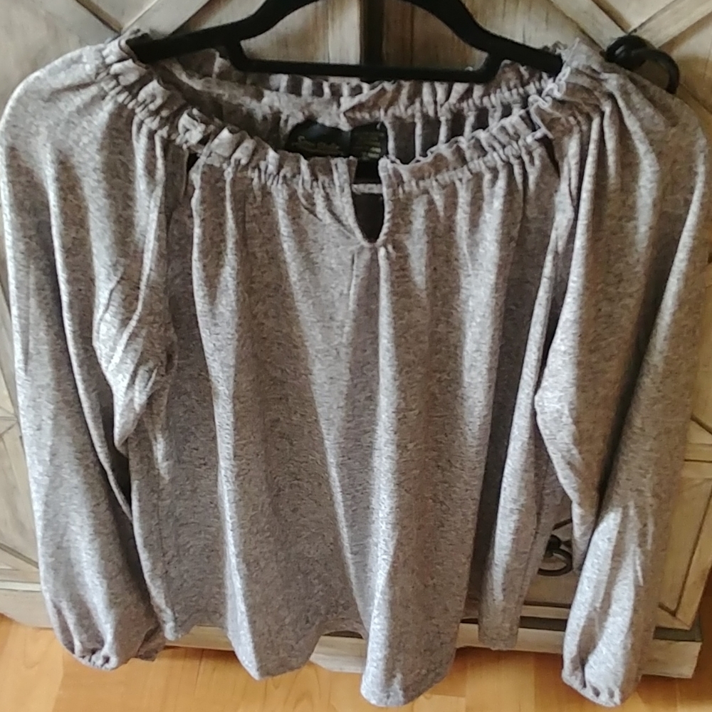 Women's cute cut out top. Never worn. Brand new!